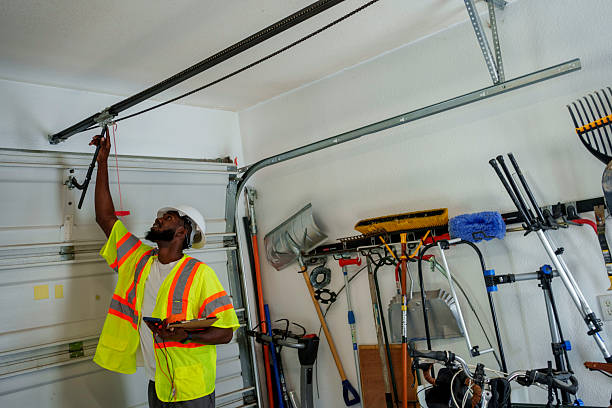 Professional Garage Door Panel Replacement technician working in East Prairie, MO